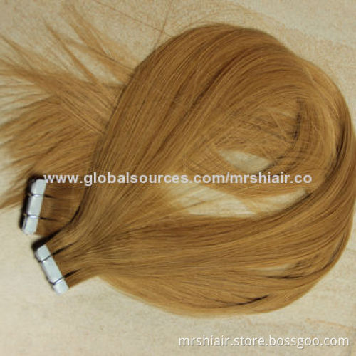 22-inch light brown Peruvian straight tape in hair